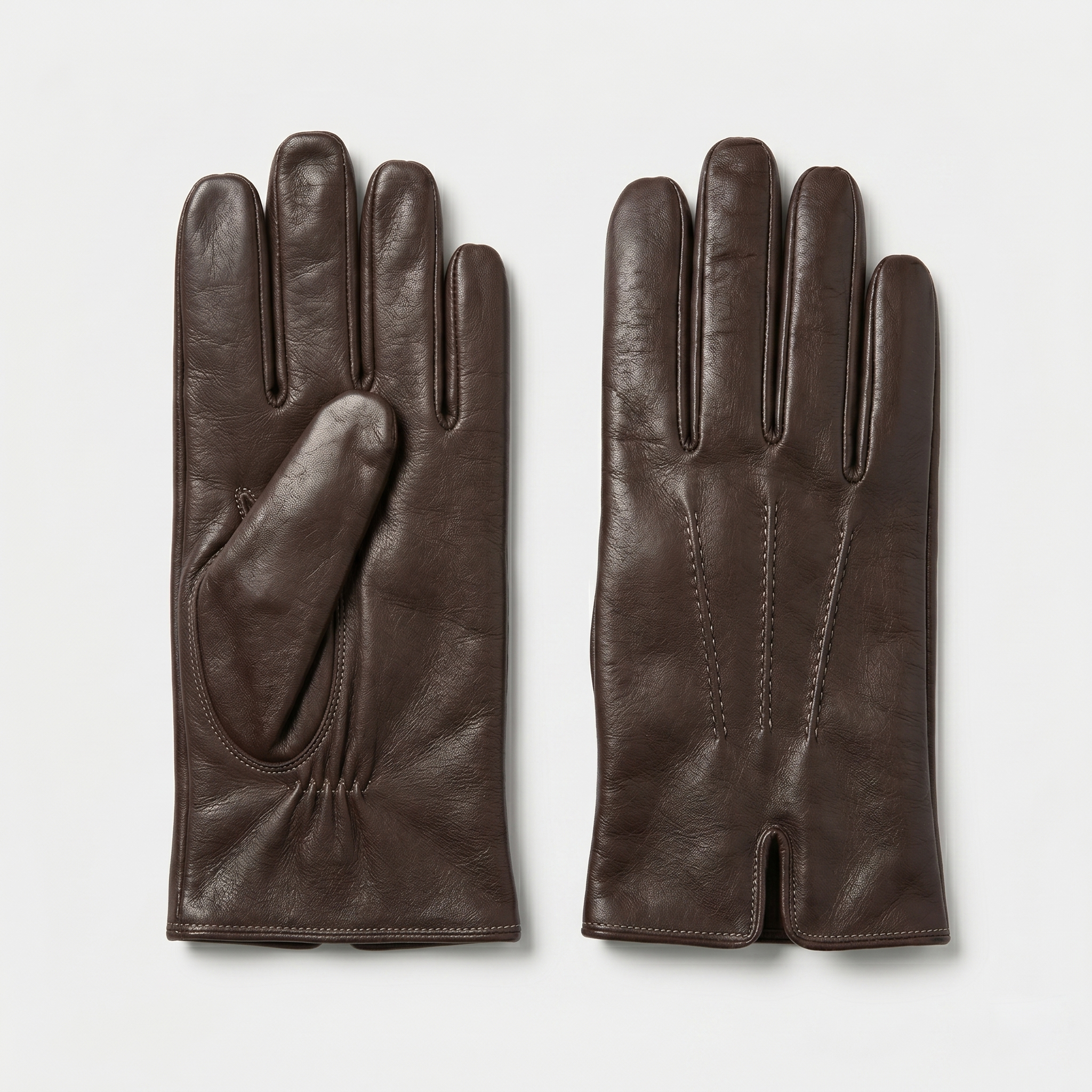 Correct packshot of leather gloves - flat and separated on a clean white background